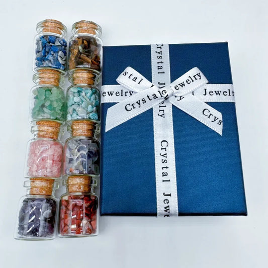 geluksflesje met krachtsteentjes verpakt in een mooie cadeaubox